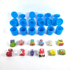 Lot Of 12 Trash Pack Trashies With Cans  Includes Rare Galacto Garbo in Red